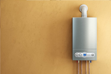 Wall-mounted gas combi boiler installed in a Manchester home